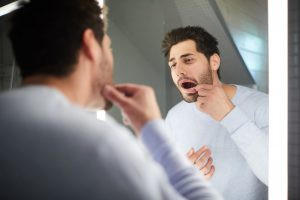 man with toothache