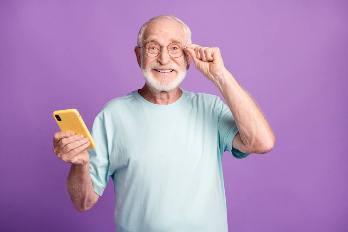 Older man smiling and wondering if he still has some teeth can he have dentures.